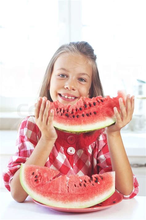 Child Eating Watermelon Stock Image Colourbox
