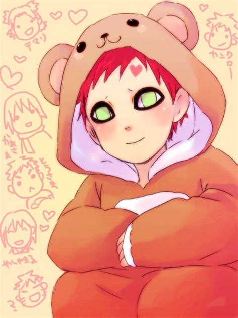 An Anime Character With Green Eyes And A Teddy Bear On His Head