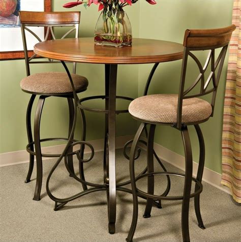 That is why you can place this kind of table for your house kitchen with some chairs. Pub Table Counter Height Round Cherry Wood Metal Base Bar ...