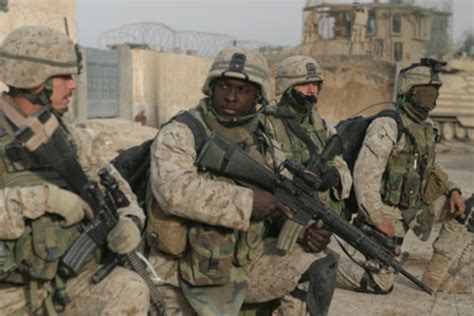 Us Marines Prepare To Step Off On A Patrol Through The City Of