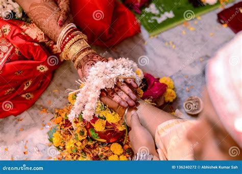 Indian Couples Holding Hands In Their Wedding Ceremoney Stock Photo