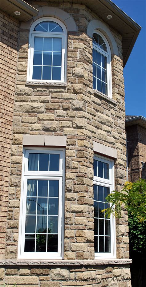 Single Casement Window With Transom Plus Arched Transoms On The Second