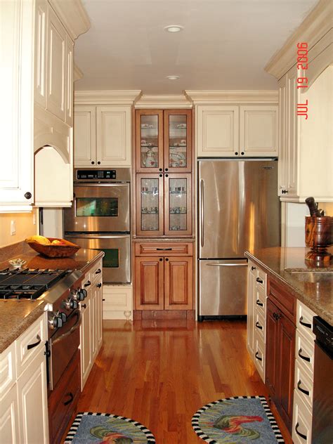 Maybe you would like to learn more about one of these? Crown moulding up top. Traditional two tone kitchen ...
