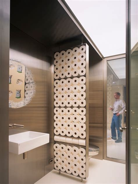 Do so above the toilet or right under the mirror and above the sink, as done in this space designed by leanne ford. Interior Design Ideas for powder room storage Spaces
