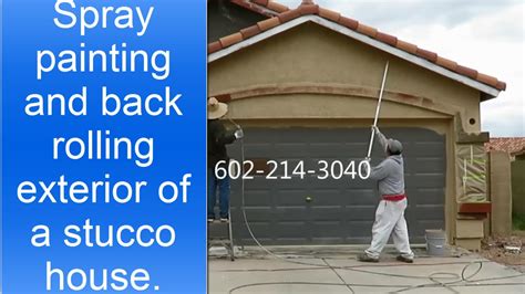 Spray Painting And Back Rolling Exterior Of A Stucco House Youtube