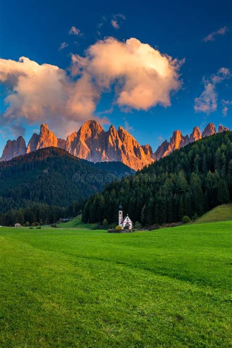 Landscapes With San Giovanni Church And Small Village In Val Di Funes
