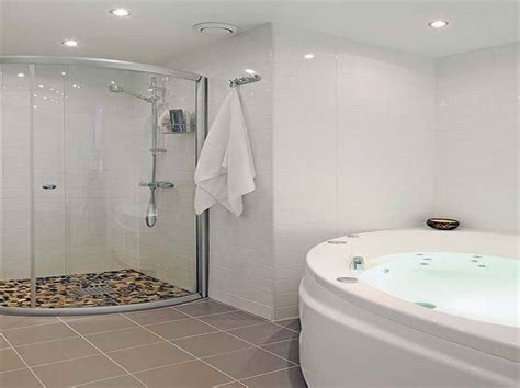 Swedish Bathroom Design With Round Bath Tub And Bath Towel Also Shower