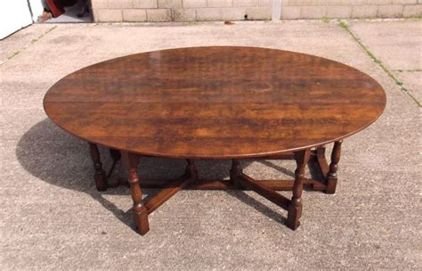 This dining table uses black square feet and the visual look of this table looks like the common wood. ANTIQUE FURNITURE WAREHOUSE - Large Antique Oval Oak Table ...
