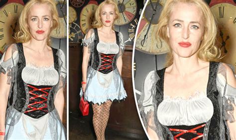 Gillian Anderson Stuns Onlookers In Raunchy Wench Costume And Fishnets