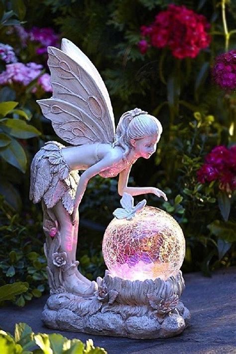 Each adorable piece in our fairy garden décor collection is priced at an amount you can afford. Garden Statue Fairy With Globe Solar Powered Lawn ...