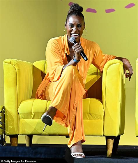 Issa Rae Teases Cleavage In Orange Co Ord While Onstage During The 2022