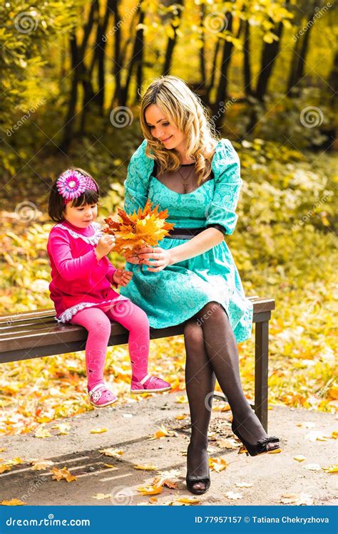 Mother And Daughter In The Autumn Park Stock Image Image Of Leaves