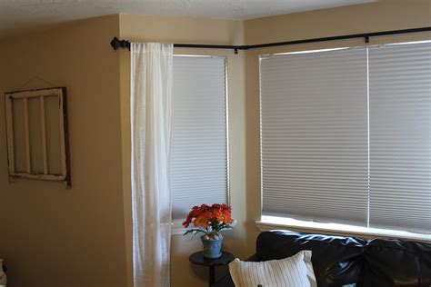 Ships free orders over $39. DIY Bay Window Curtain Rod - Pinching Your Pennies