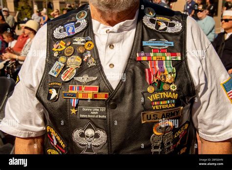 A Vietnam War Veteran Proudly Shows Off A Vest Covered With Decorations