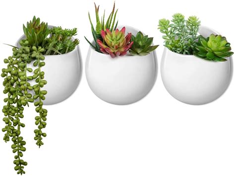 And it's easy to ship and install. Mkono Wall Planter with Artificial Plants, Decorative ...