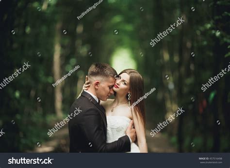 Romantic Newlywed Couple Kissing Pine Tree Stock Photo 457516498