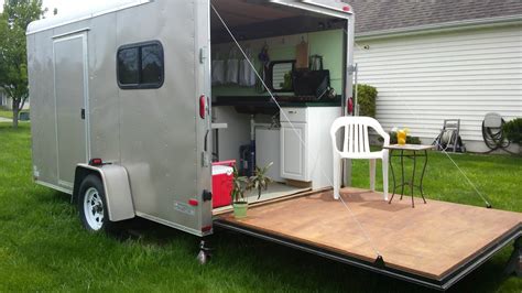 Woman Converts Cargo Trailer Into Stealthy And Cozy Off Grid Rv