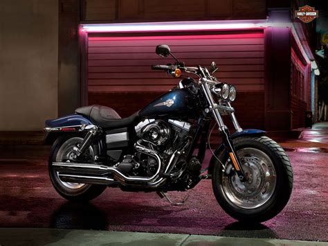 A big twin with big attitude, the dyna® fat bob® leads with a brawny front end topped with dual head lights, rolls on chunky tires, and exits with a flip of its bobtail rear fender. 2012 FXDF Dyna Fat Bob Harley-Davidson pictures, review, specs