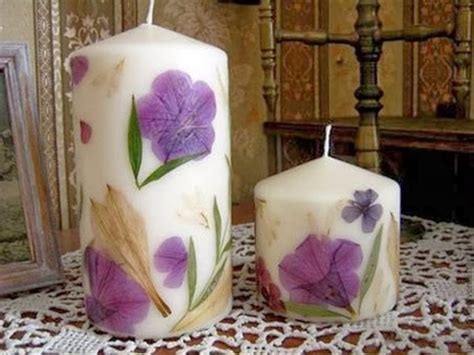 I sandwiched the flowers in between the candle and the glass, and poured a second layer. Wonderful DIY Decorate Candles With Dry Flowers