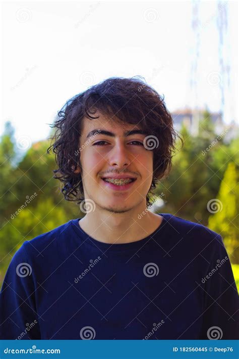 Portrait Of Young Handsome Man With Braces Stock Image Image Of Casual Home 182560445