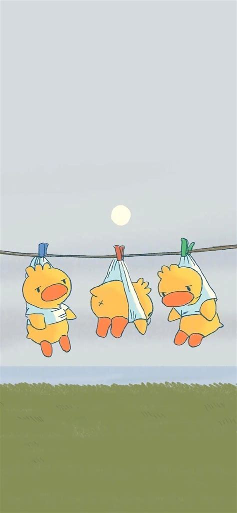 Three Teddy Bears Hanging On A Clothes Line With The Moon In The Sky