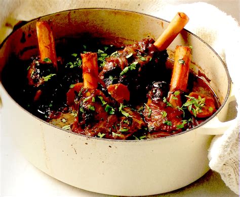Braised lamb shanks with roasted tomatoes. recipe for braised lamb shanks with red wine