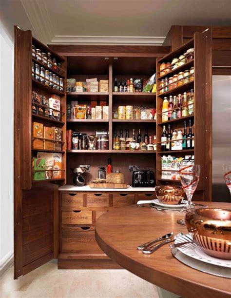 This storage pantry cabinet constitutes a pretty useful, well organized piece of kitchen furniture. Splendid Kitchen Pantry Cabinets Wood Large Design Ideas ...