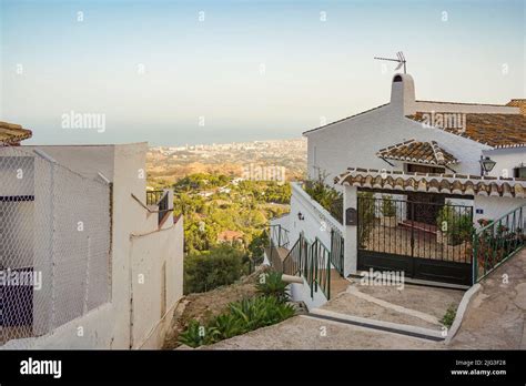 Street View Of Traditional Spanish White Village Of Mijas With
