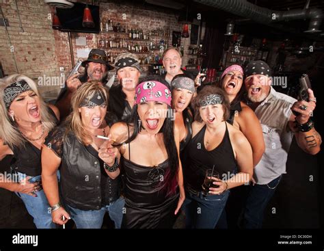 Biker Gang With Weapons And Drinks Stock Photo Alamy