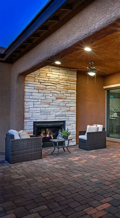 Extend Your Outdoor Hang Time With An Outdoor Fireplace Like This One