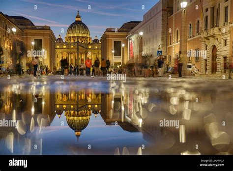 Wonderful View Of St Peter Cathedral Vatican Rome Italy Sunset Sky With Night City Lights