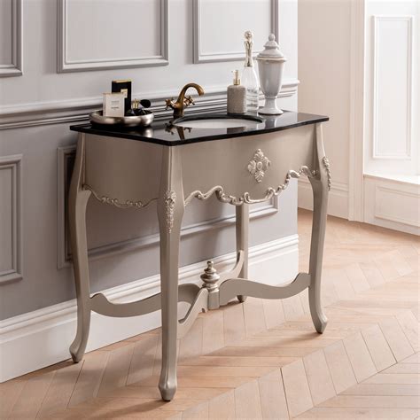 Smaller cabinets work as a corner vanity unit for limited space. Silver Antique French Style Vanity Unit | Bathroom Furniture