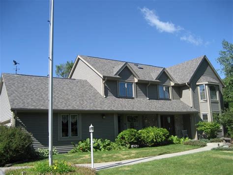 To accurately judge your shingle and color choice, we recommend that you view it on an actual roof with a pitch similar to your own roof prior to making your final color selection. | Infinity Exteriors LLC Wisconsin