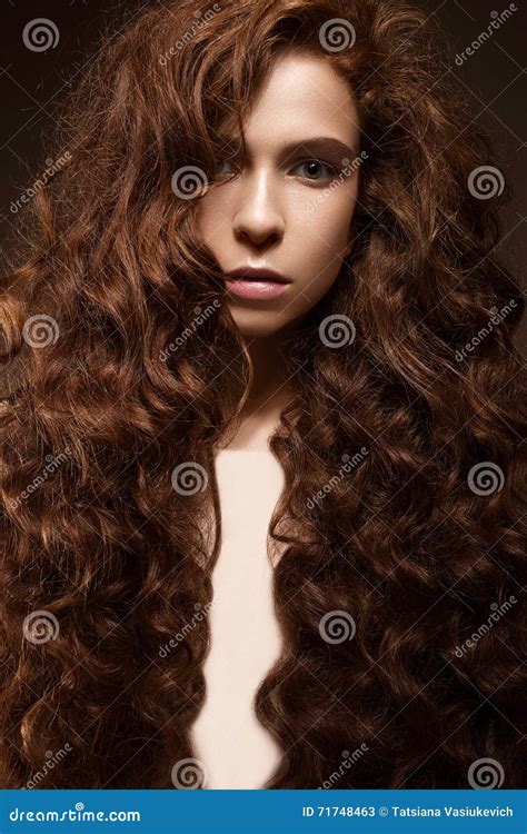 Beautiful Redhead Girl With Curls And Classic Make Up Beauty Face