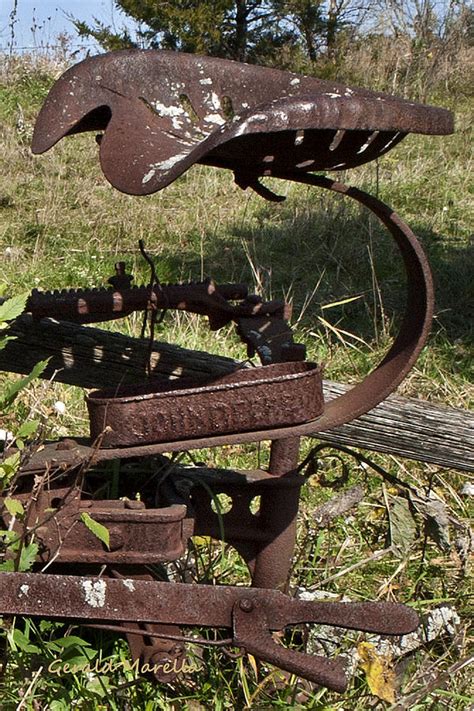 Vintage John Deere Tractor Seat Photograph by Gerald Marella
