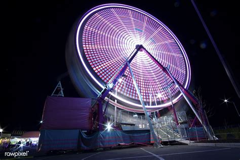 Long Exposure Scene Of A Ferris Wheel Free Image By