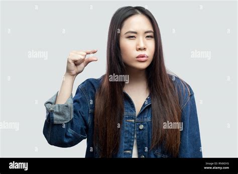 Give Me Few More Portrait Of Beautiful Brunette Asian Young Woman In Casual Blue Denim Jacket