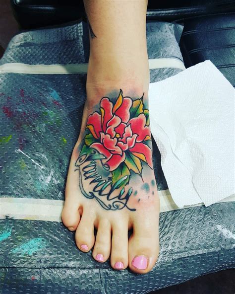 Flowers are loved all over the world for their exotic beauty and what better way to capture the beauty of a flower than to have it tattooed on your body. Foot tattoo, flower tattoo, family tattoo, lotus flower ...