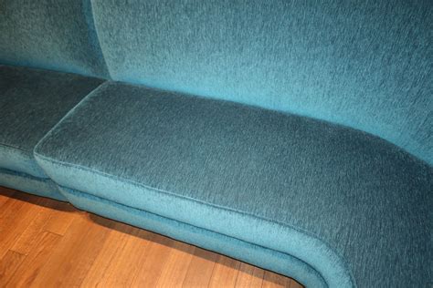 The piece has wooden legs and is in. Teal Blue Curved Banquette (Chenille Upholstered), Approx ...
