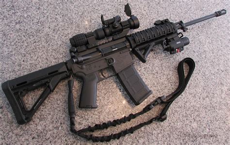 Bushmaster Carbon 15 Tactical Warfa For Sale At