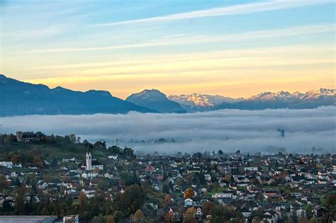 Autumn Sunrise With Fog And Swiss Mountains In The Background Fog