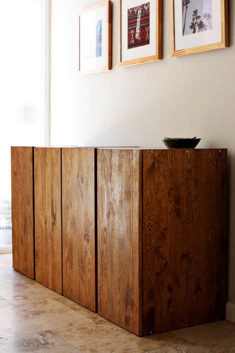 Leksvik pine cd cabinets + set of 5 ikea antique pine shelves. Stained pine Ikea Ivar cabinets. - Model Home Interior Design