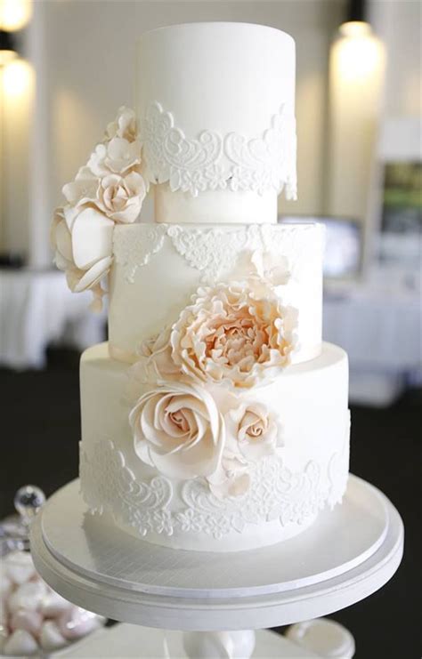 Simple yet classy, can be the best choice when it comes to engagement cake designs. 40+ Elegant and Simple White Wedding Cakes Ideas - Page 4 of 5 - WeddingInclude