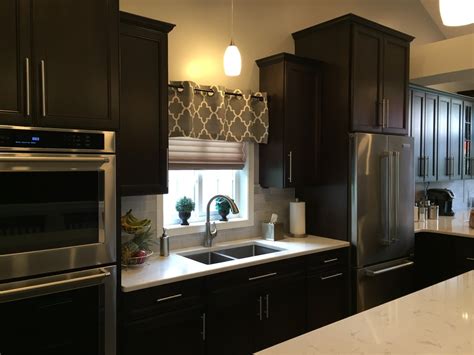 From contemporary and modern to refined and traditional. Heffleger Kitchen Remodel - Before and After - Contemporary - Kitchen - Philadelphia