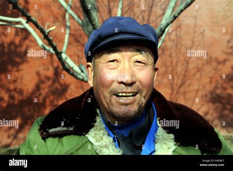 Portrait Of A Chinese Man Wearing A Traditional Mao Cap Stock Photo Alamy