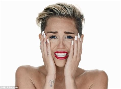 Miley Cyrus Gets Fully Naked To Straddle Wrecking Ball In Video Of The