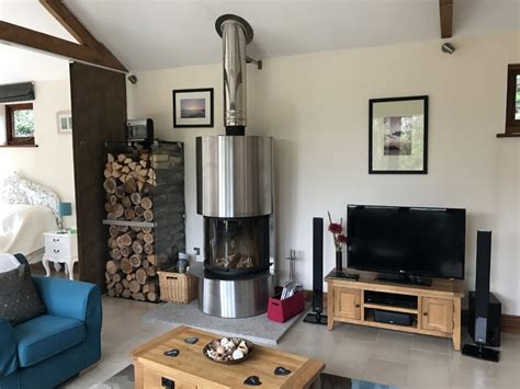 Convection, forced air, heater fan, radiant Scan DSA 5 in Open Plan Bedroom wood burning stove ...