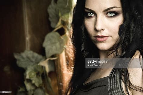 Singer Amy Lee Of Evanescence Poses At A Portrait Session For