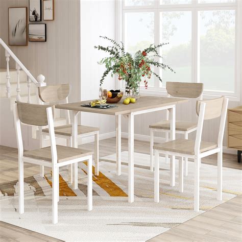 Since all four sides fold, you can go from a round table that seats six, to a compact square design in no time. 5-Piece Dining Room Table Set, Modern Metal Dining Set ...