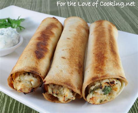 Roll up tortilla and place on a lightly greased cookie sheet, seam side down. Creamy Chicken Baked Flautas | For the Love of Cooking